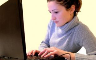 Young Woman at Computer